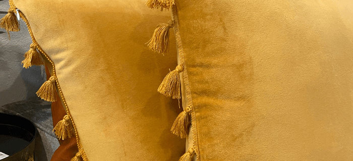 Gold tassel pillows